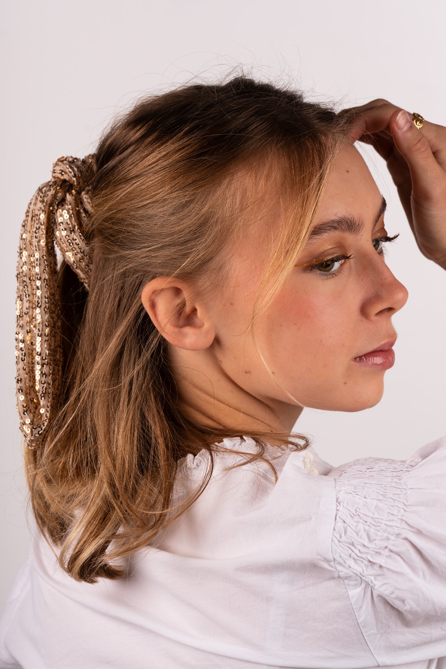 Gold Pailetten Schleife